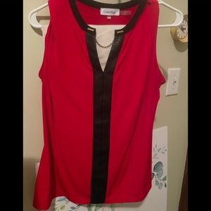 Red sleeveless blouse